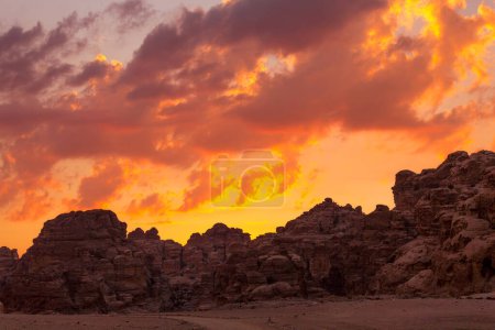 Photo for Sunset colorful orange sky landscape with sandstone rocks in Little Petra archaeological site, Jordan - Royalty Free Image