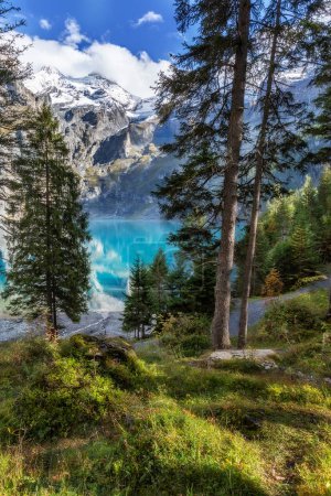 Amazing turquoise Oeschinnensee in Swiss Alps, Kandersteg, Berner Oberland, Switzerland