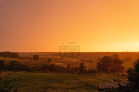 rustic orange sunset ukrainian sunset landscape gradient cloudy sky.