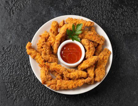Photo for Crispy Shredded Chicken served with sweet chilli sauce. Party finger food snack concept. - Royalty Free Image