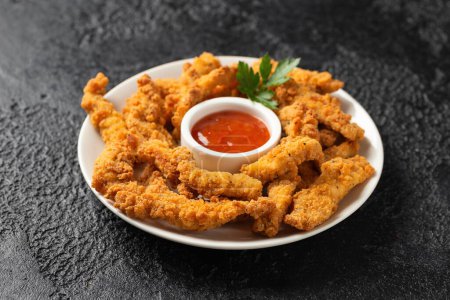 Photo for Crispy Shredded Chicken served with sweet chilli sauce. Party finger food snack concept. - Royalty Free Image