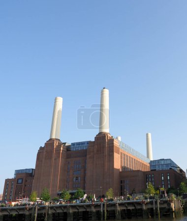 Photo for The famous Battersea Power Station as redeveloped as housing and retail in London in the UK - Royalty Free Image