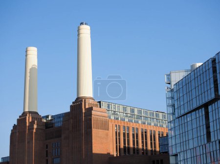 Photo for The famous Battersea Power Station as redeveloped as housing and retail in London in the UK - Royalty Free Image