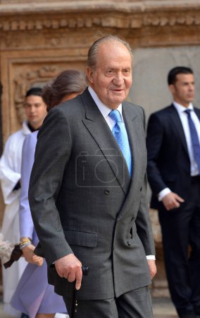 Photo for The King of Spain Don Juan Carlos  with other members of the Spanish  Royal Family attend Easter Mass in the Cathedral of Palma de Mallorca on April 20th 2014 - Royalty Free Image