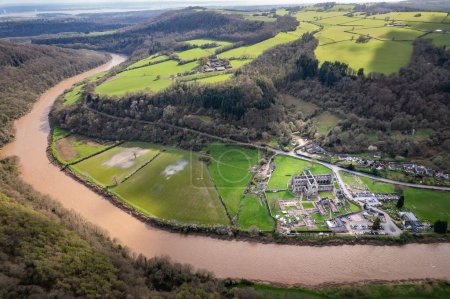 Amazing aerial panorama of Tintern Abbey, River Wye, and the nearby landscape, UK