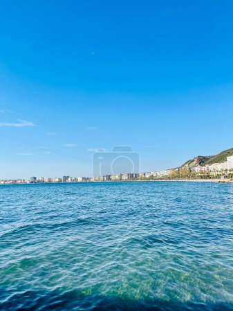 Photo for Summer cityscape of Vlore town. Beautiful seascape of Adriatic sea, Albania. Summer holidays concept. Vertical photo - Royalty Free Image