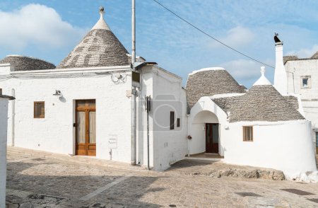 Photo for The trulli, typical limestone houses of Alberobello in southern Puglia, Italy - Royalty Free Image