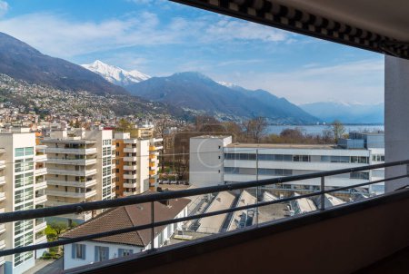 The city of Locarno with modern buildings seen from above, Ticino canton, Switzerland