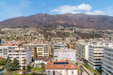 The city of Locarno with modern buildings seen from above, Ticino canton, Switzerland