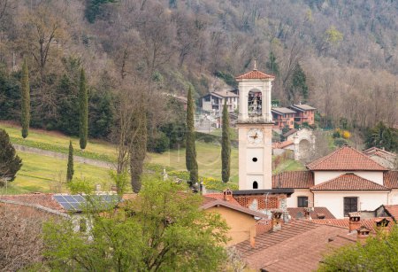 View of bell tower of Santa Maria in Zuigno church in Casalzuigno, province of Varese, Lombardy, Italy