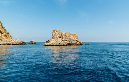 Landscape of Mediterranean sea with Faraglioni of Scopello at Zingaro Nature Reserve, Sicily, Italy