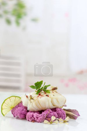 Cod steak on purple cauliflower
