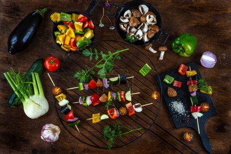 Photo for Preparations of vegetable skewers on a worktop, top view - Royalty Free Image