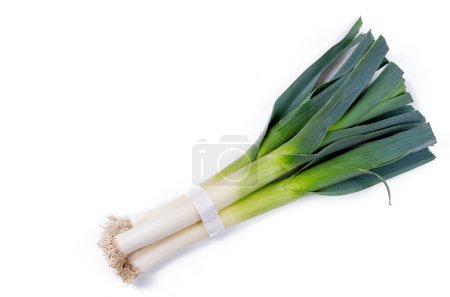 Photo for Top view bunch of leeks on white background - Royalty Free Image