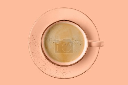 Pink coral  vintage cup of hot coffee flying isolated on peach fuzz background. Porcelain cup in trendy color of year 2024 Peach Fuzz.