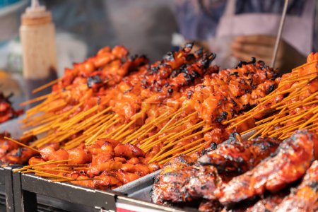 Satay or sate is a Southeast Asian form of kebab made from seasoned, skewered and barbecued meat, served with a sauce.