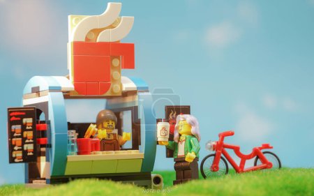 Photo for Bangkok, Thailand - October 3, 2022: Lego Creator Coffee Cart with Barista and Visitor Minifigures Outdoor. - Royalty Free Image