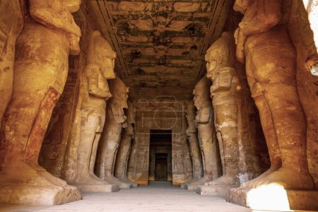 Interior with the sculptures of the pharaohs in the Abu Simbel Temple in southern Egypt in Nubia next to Lake Nasser. Temple of Pharaoh Ramses II, travel lifestyle