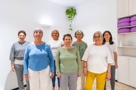 Portrait of a group of mature women attending Qi gong class