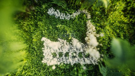3D rendering of a factory made of tiny white mushrooms surrounded by green moss and ferns, highlighting the sustainable relationship between industry, technology, and nature conservation