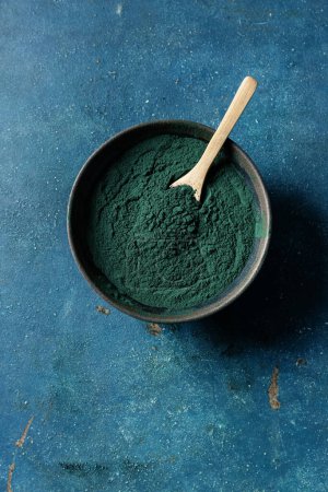 Photo for Spirulina algae powder in a bowl. - Royalty Free Image
