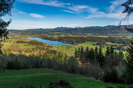 Scenic spring hike to the Stoffelberg near Niedersonthofen in the Allgau with a beautiful view of Lake Niedersonthofen