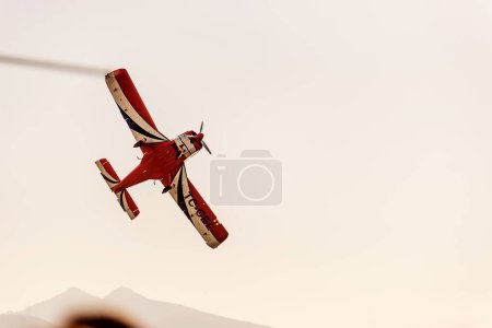 Photo for Izmir, Turkey - September 9, 2022: Acrobatics pilot demonstrate on the sky on the liberty day of Izmir at Izmir Konak Turkey - Royalty Free Image
