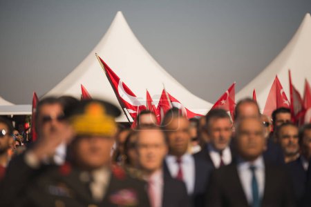 Photo for Izmir, Turkey - September 9, 2022: Close up shot of Turkish flags in a crowded people at the celebrations of liberation day Izmir Turkey at the Republic square. - Royalty Free Image