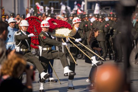 Photo for Izmir, Turkey September 9 2022 Soldiers carry wreaths to be placed on ataturk bust on the September 9 on the day of liberation Izmir city at Republic Square. - Royalty Free Image