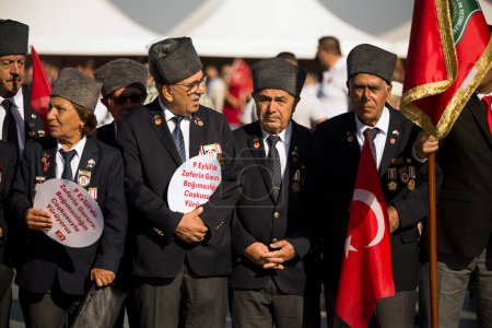 Photo for Izmir, Turkey - September 9, 2022: Veterans in the same frame on the celebrations Liberation day of Izmir. All of them are Cyprus Veterans. Gulsen Kucuk, Recep Yoruk, Yakup Demirtas - Royalty Free Image