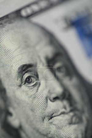 Photo for Close up shot of Benjamin Franklin's face on a hundred dollar banknote. - Royalty Free Image