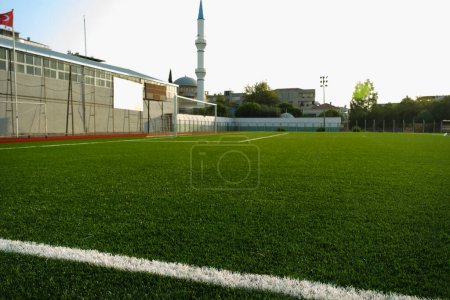 Photo for Close up shot of a football pitch with artificial grass. - Royalty Free Image