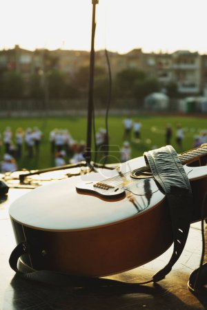 Photo for Close up shot of guitar on a concert. - Royalty Free Image