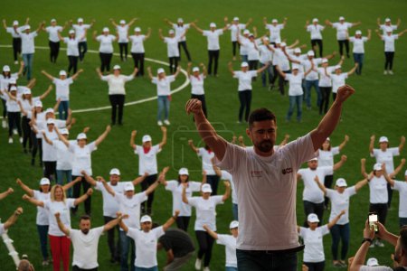 Foto de Izmir, Turkey - August 29, 2022: Bornova municipality zeybek dance choreography 30 August victory day of Turkey at Stadium Bornova - Imagen libre de derechos