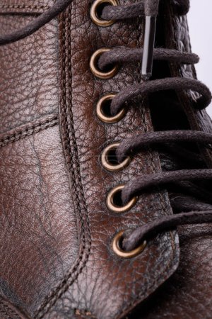Foto de Close up shot of shoelace on a leather boot. - Imagen libre de derechos