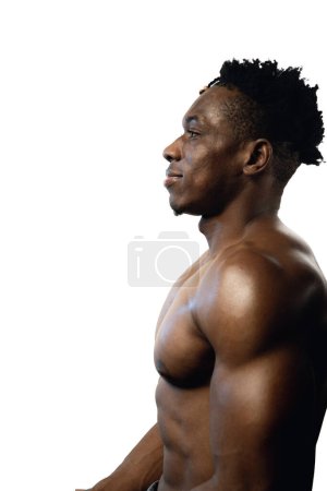 Photo for Face profile of a muscular 20s black male on a white background - Royalty Free Image