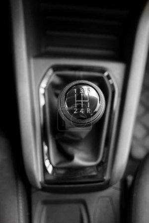 Photo for Detailed shot of a 5-speed manual transmission gear stick, showcasing its design and markings. - Royalty Free Image