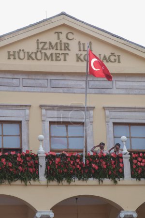 Photo for Izmir, Turkey, September, 9, 2023, In celebration of the city's liberation, cavalry symbolically raise the Turkish flag at the Izmir Government Mansion - Royalty Free Image