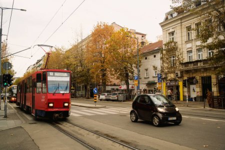 Photo for Belgrade, Serbia - December 2, 2023: Street view of the Kalemegdan area in Belgrade, Serbia, captured during the day featuring the historical tramway, showcasing the city's rich heritage and vibrant urban life - Royalty Free Image