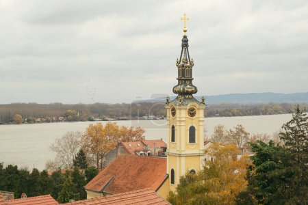Photo for Belgrade, Serbia - December 3, 2023: An overcast view captures the varied urban landscape, punctuated by the iconic Zemun Tower and distant church spires - Royalty Free Image