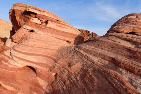Close up of the striped Fire Wave rock strata which forms pink patterned waves in the landscape - Valley of Fire State Park, Nevada, USA