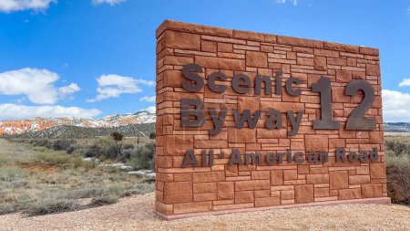 Impressive red sandstone sign for Scenic Route Byway 12 in Utah, considered one of the most beautiful roads in the United States. Taken near Red Canyon.