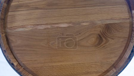 Wooden oak barrel close-up in backdrop light