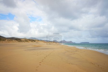 Photo for Beach in Porto Santo island, Portugal. Footprints in sand. - Royalty Free Image