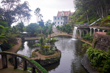 Photo for Monte Palace tropical garden, Funchal, Madeira, Portugal. View of palace, pond and waterfall. - Royalty Free Image