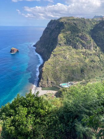 Photo for View of beautiful coast in Madeira, Portugal. Summer day, green coast and blue sea. - Royalty Free Image
