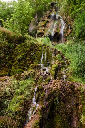 Waterfall Bad Urach at Southern Germany Longexposure. Cascade panorama in Bad Urach Germany is a popular natural attraction and waterfall sight called Uracher Wasserfall . Natural reserve in autumn