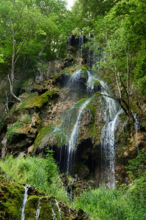 Der Uracher Wasserfall in Baden-Württemberg im Sommer. Der Uracher Wasserfall in Baden-Württemberg im Sommer.