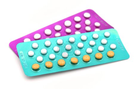 Photo for Colorful oral contraceptive pill strips isolated on white background. - Royalty Free Image