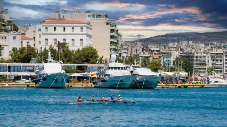 Photo for Kayaking lessons and luxury yachts in marina Zeas at Piraeus port in Greece - Royalty Free Image